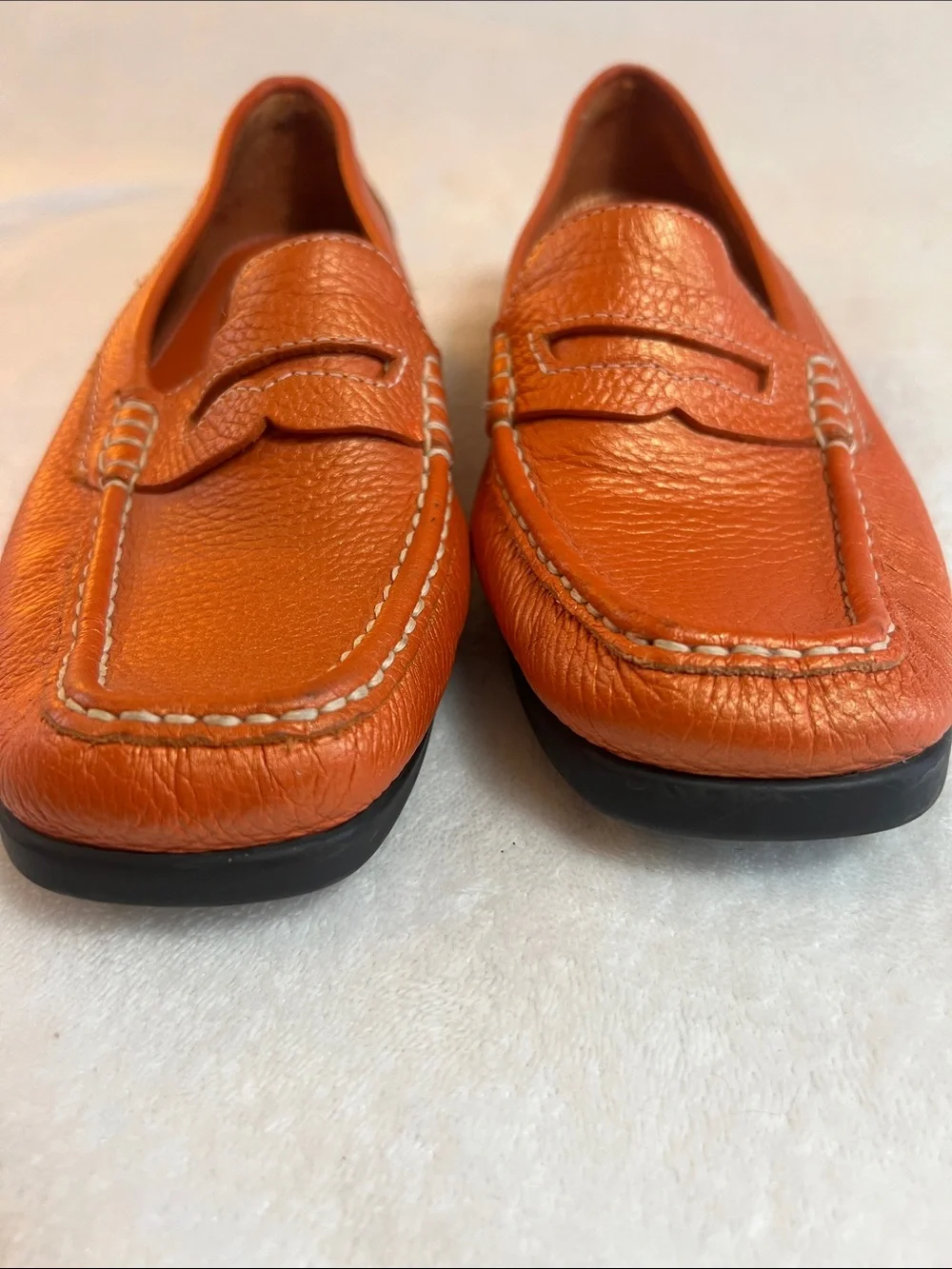 Rockport women’s orange pebbled leather square toe penny loafers